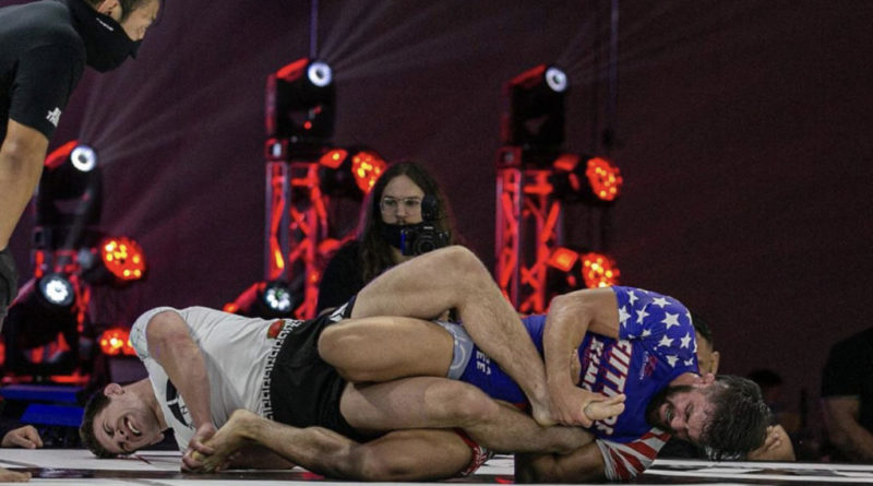Tonon attacks a straight ankle lock in the final moments against Leon. (Image courtesy of Instagram: @gnarcorpphoto)